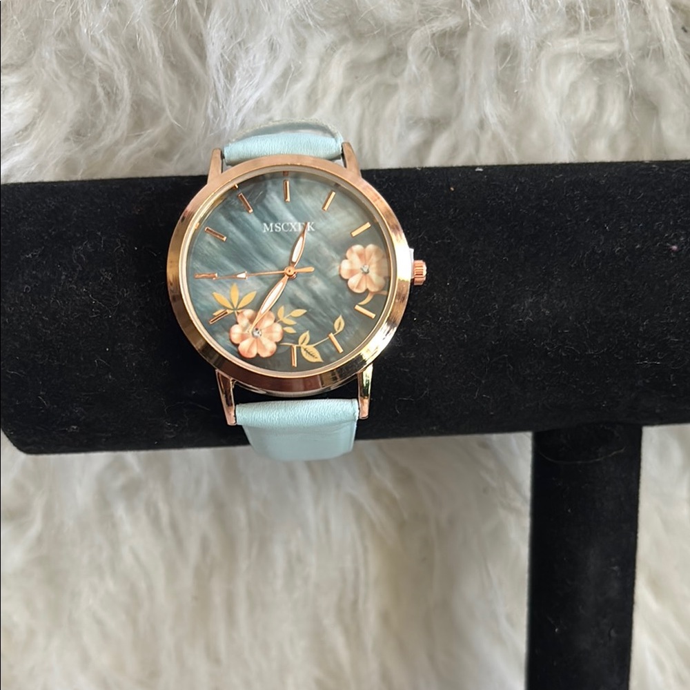 Blue and Gold Elegant Watch with Date Window